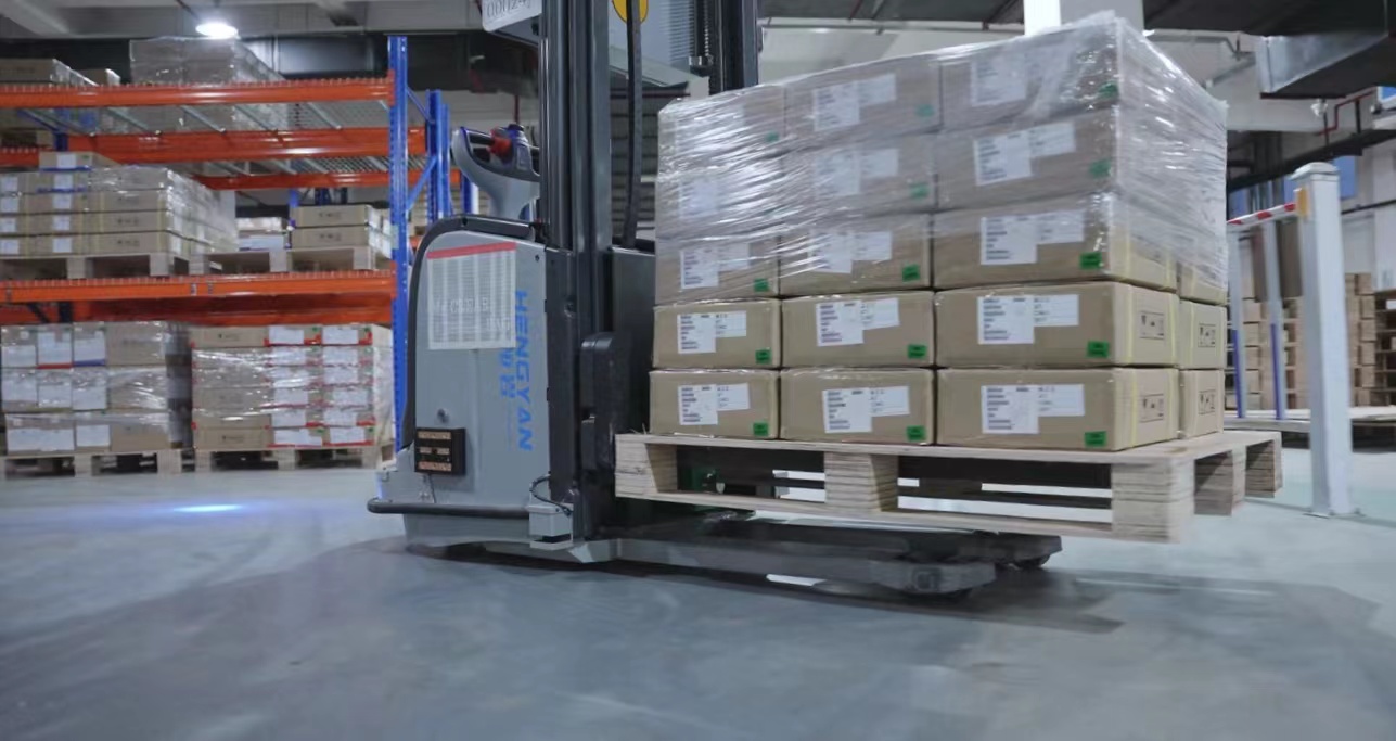 Olympic Circuit automated warehouse with forklift AGV system